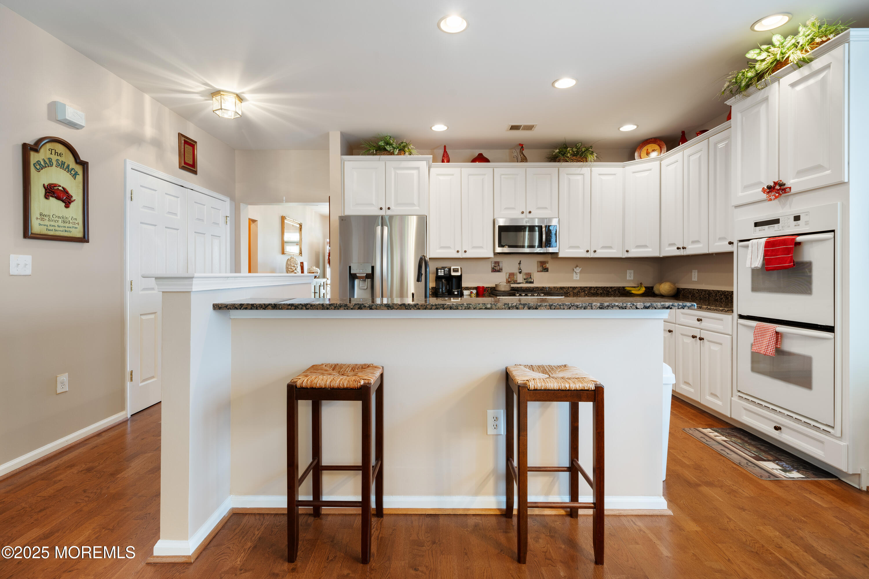 24 Pond View Circle Barnegat, NJ 08005 - Photo 14 of 50 a kitchen with stainless steel appliances granite countertop a refrigerator sink and cabinets