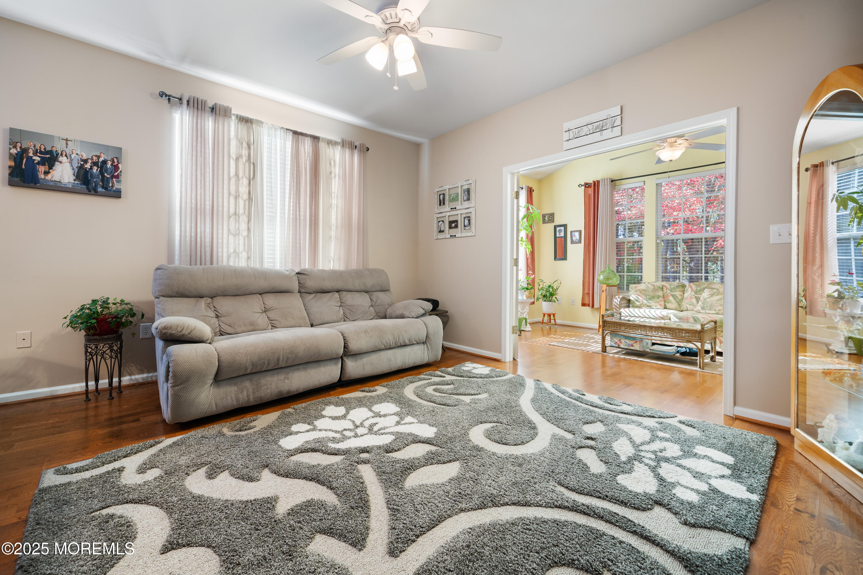 24 Pond View Circle Barnegat, NJ 08005 - Photo 17 of 50 a living room with furniture and a large window