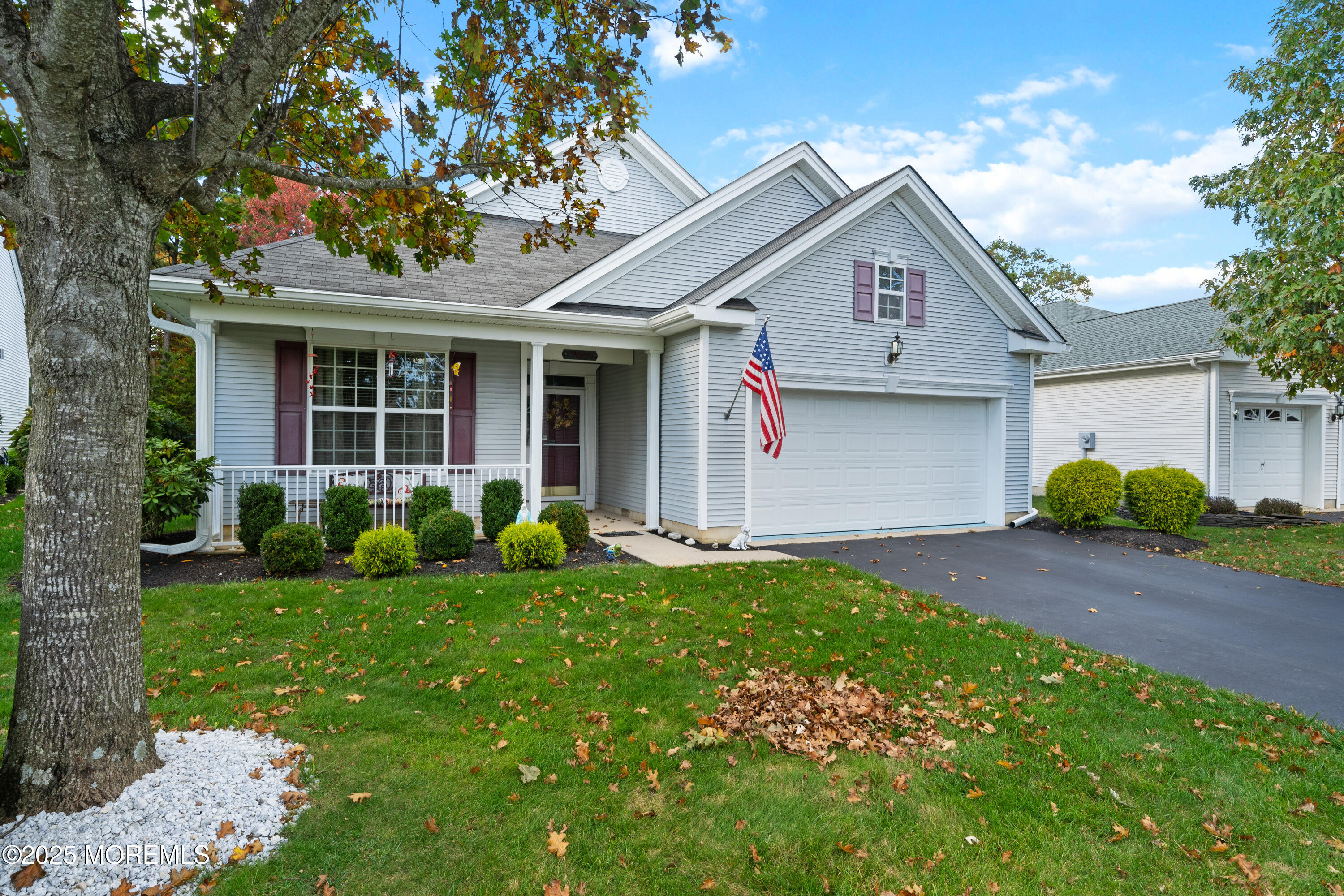 24 Pond View Circle Barnegat, NJ 08005 - Photo 4 of 50 a front view of a house with a yard and garage
