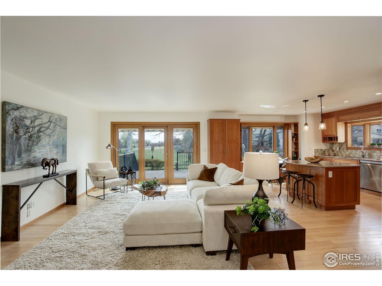 4462 Wellington Road Boulder, CO 80301 - Photo 14 of 37 a living room with furniture and a table