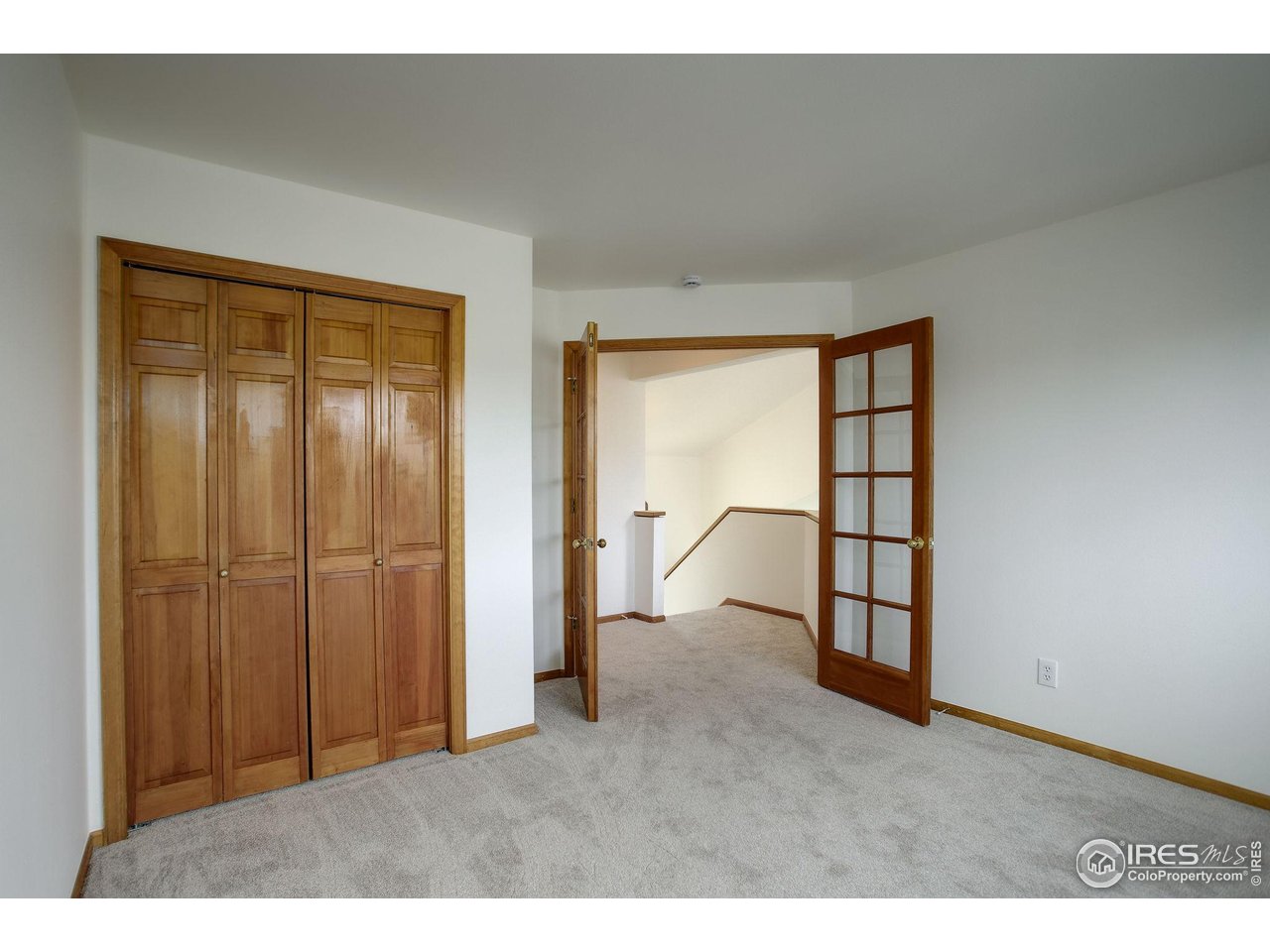 4462 Wellington Road Boulder, CO 80301 - Photo 26 of 37 an empty room with windows and closet