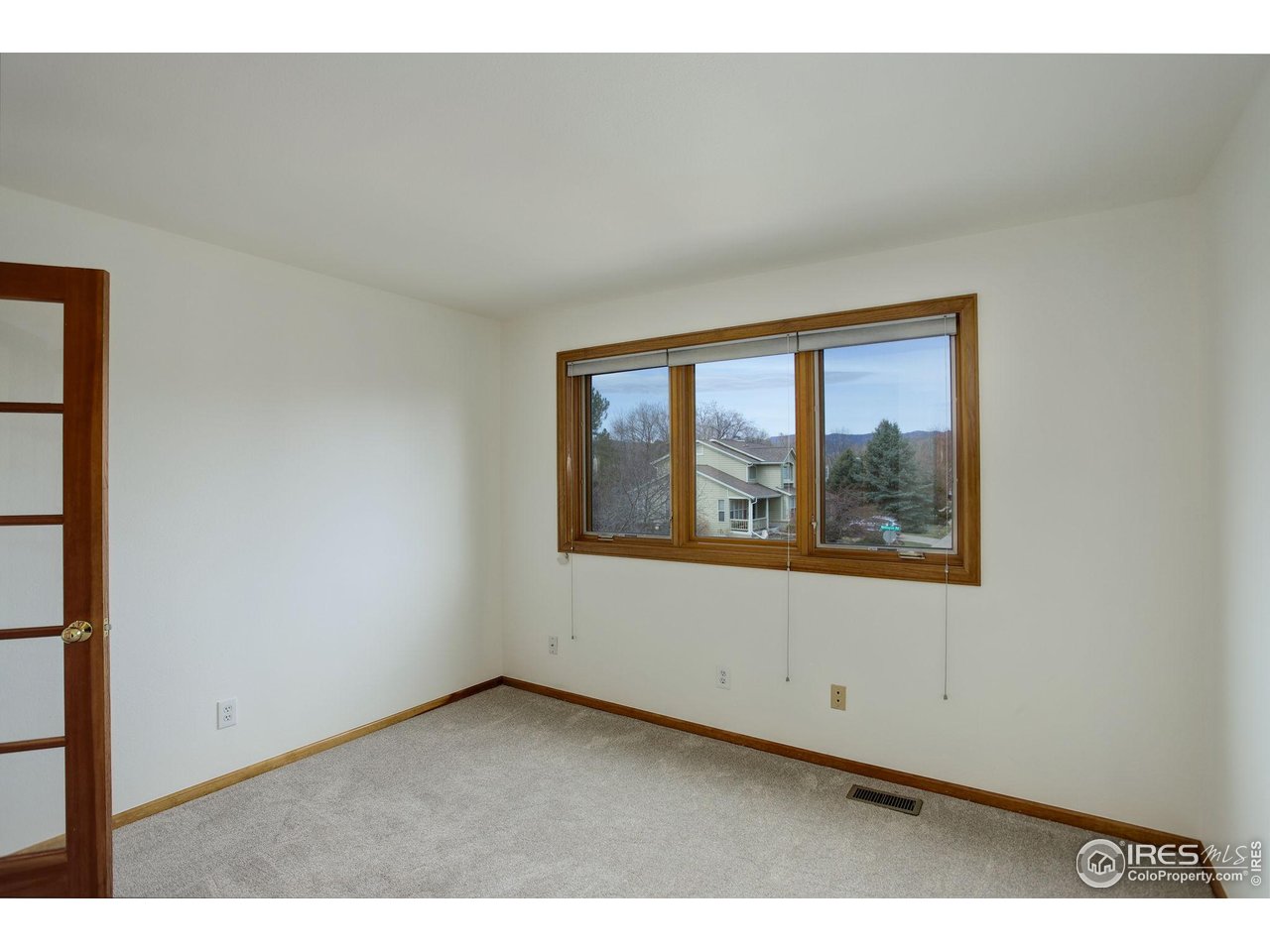 4462 Wellington Road Boulder, CO 80301 - Photo 27 of 37 a view of an empty room with a window