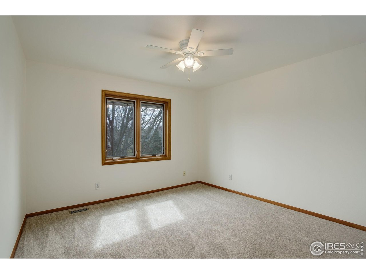 4462 Wellington Road Boulder, CO 80301 - Photo 29 of 37 a view of an empty room with a window