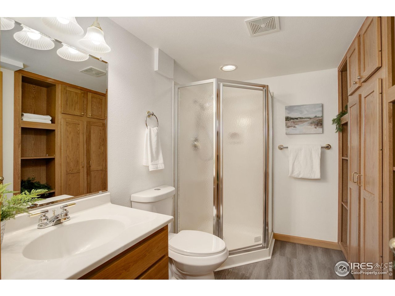 4462 Wellington Road Boulder, CO 80301 - Photo 32 of 37 a bathroom with a sink toilet and shower