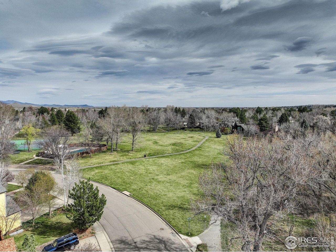 4462 Wellington Road Boulder, CO 80301 - Photo 34 of 37 a view of a water pond with lots of trees
