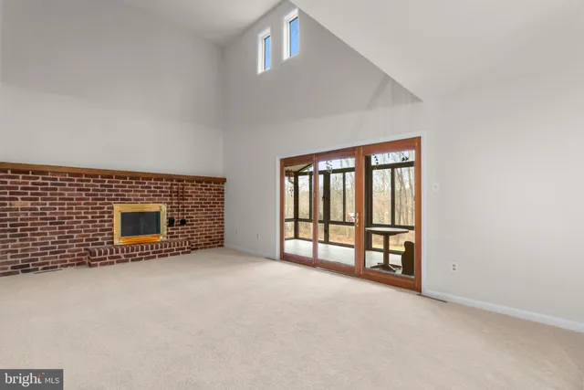 a view of a bathroom from a hallway