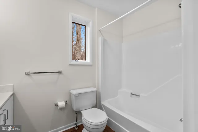 a sign board on the side of a road