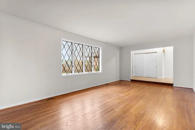 a kitchen with stainless steel appliances granite countertop a sink a stove and cabinets