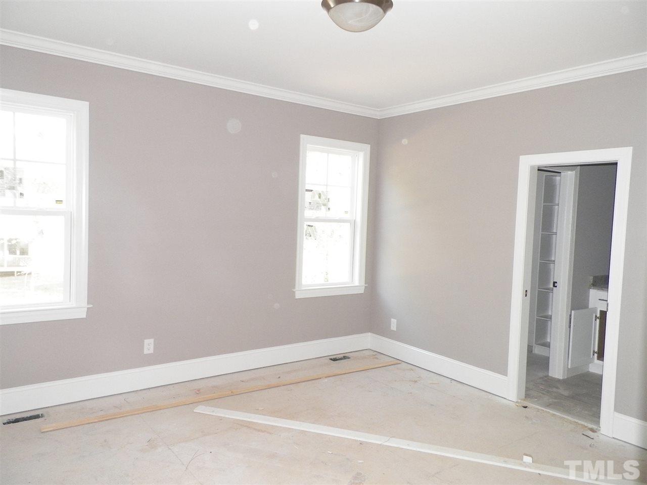 6113 Spring Branch Circle Raleigh, NC 27603 - Photo 17 of 22 a view of a room that has a window in it
