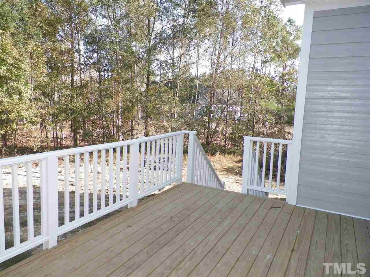 6113 Spring Branch Circle Raleigh, NC 27603 - Photo 21 of 22 a view of a balcony with wooden floor