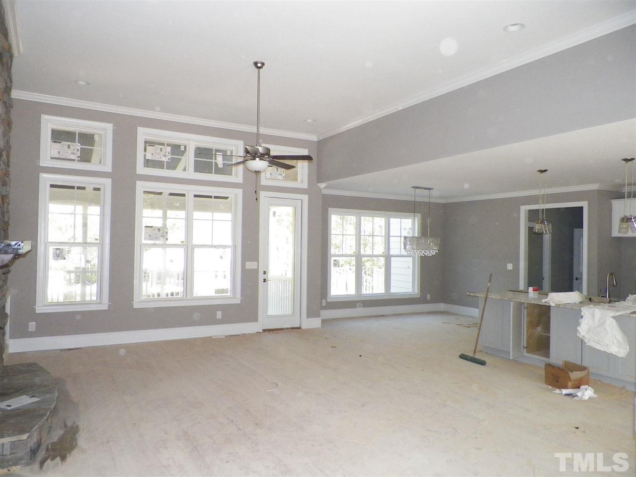 6113 Spring Branch Circle Raleigh, NC 27603 - Photo 5 of 22 a view of an empty room with a window