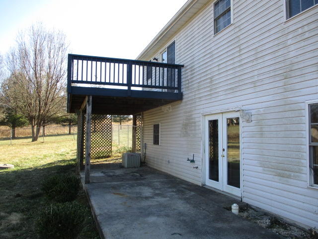 9739 Stewartsville Road Goodview, VA 24095 - Photo 10 of 11 a view of a house with a porch
