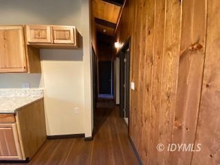 53551 West Ridge Road Idyllwild, CA 92549 - Photo 12 of 33 a view of hallway with stairs and wooden floor