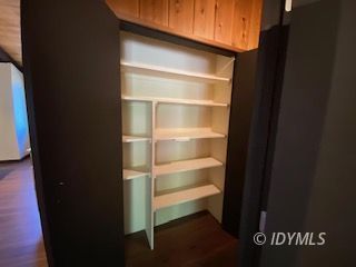 53551 West Ridge Road Idyllwild, CA 92549 - Photo 15 of 33 a view of walk in closet with empty racks