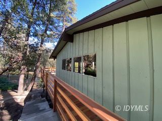 53551 West Ridge Road Idyllwild, CA 92549 - Photo 27 of 33 a balcony with wooden floor