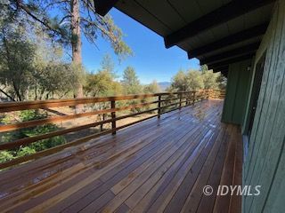 53551 West Ridge Road Idyllwild, CA 92549 - Photo 28 of 33 a view of a balcony with wooden floor