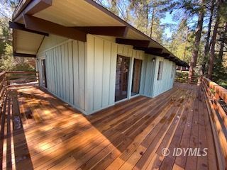 53551 West Ridge Road Idyllwild, CA 92549 - Photo 30 of 33 a view of backyard with wooden floor and fence