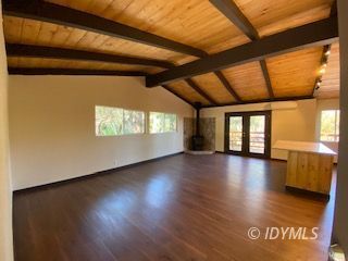 53551 West Ridge Road Idyllwild, CA 92549 - Photo 7 of 33 a view of a livingroom with wooden floor and windows