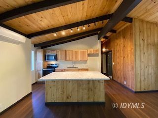 53551 West Ridge Road Idyllwild, CA 92549 - Photo 10 of 33 a room with wooden floor and furniture