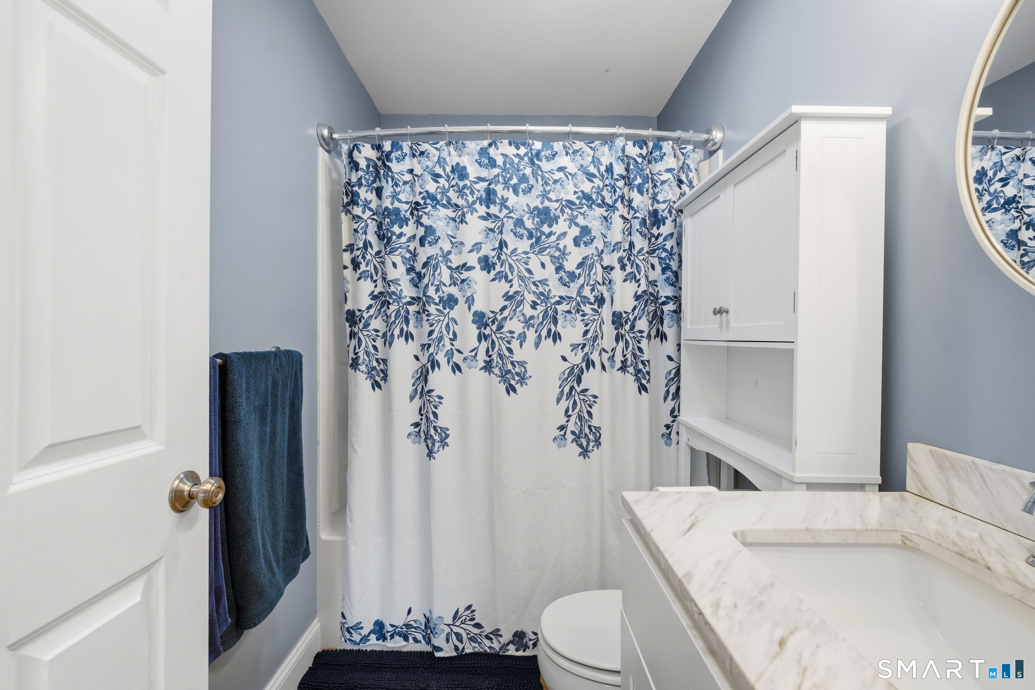 71 Smith Street Putnam, CT 06260 - Photo 10 of 25 a bathroom with a sink toilet and shower