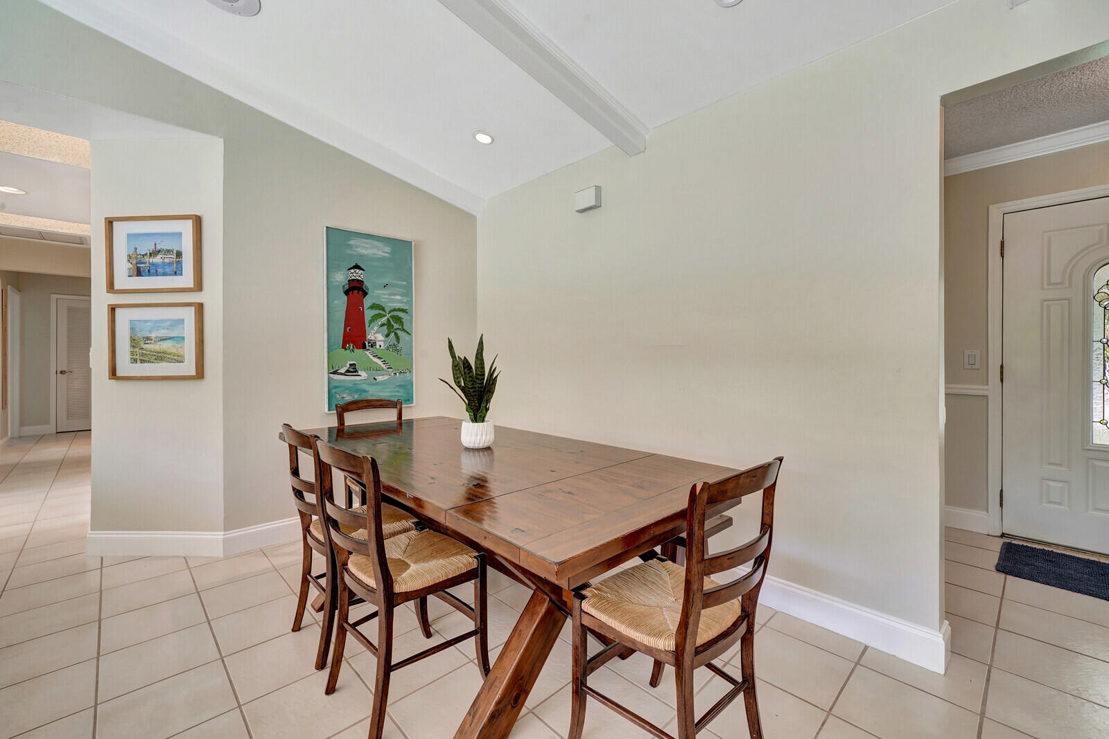 6009 Eagles Nest Drive Jupiter, FL 33458 - Photo 11 of 49 a view of a dining room with furniture and window