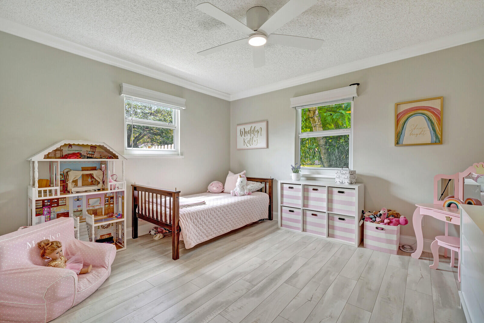 6009 Eagles Nest Drive Jupiter, FL 33458 - Photo 23 of 49 a living room with furniture and a baby crib