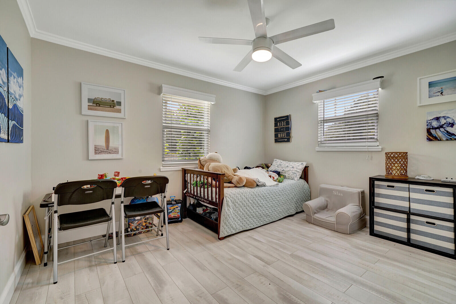 6009 Eagles Nest Drive Jupiter, FL 33458 - Photo 24 of 49 a bedroom with furniture and a window