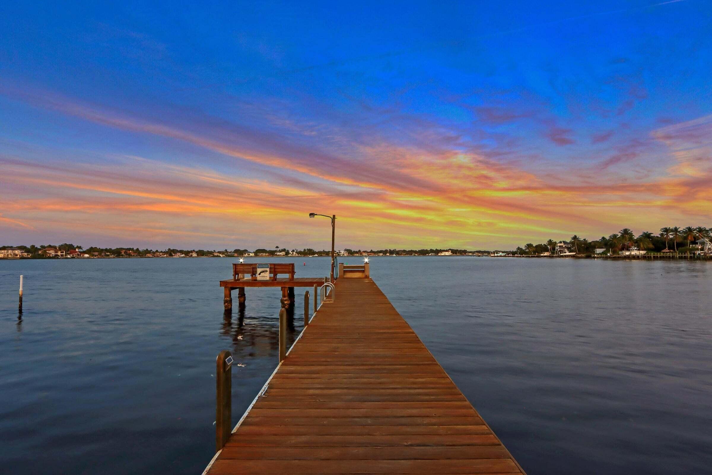 6009 Eagles Nest Drive Jupiter, FL 33458 - Photo 40 of 49 a view of a lake from a balcony