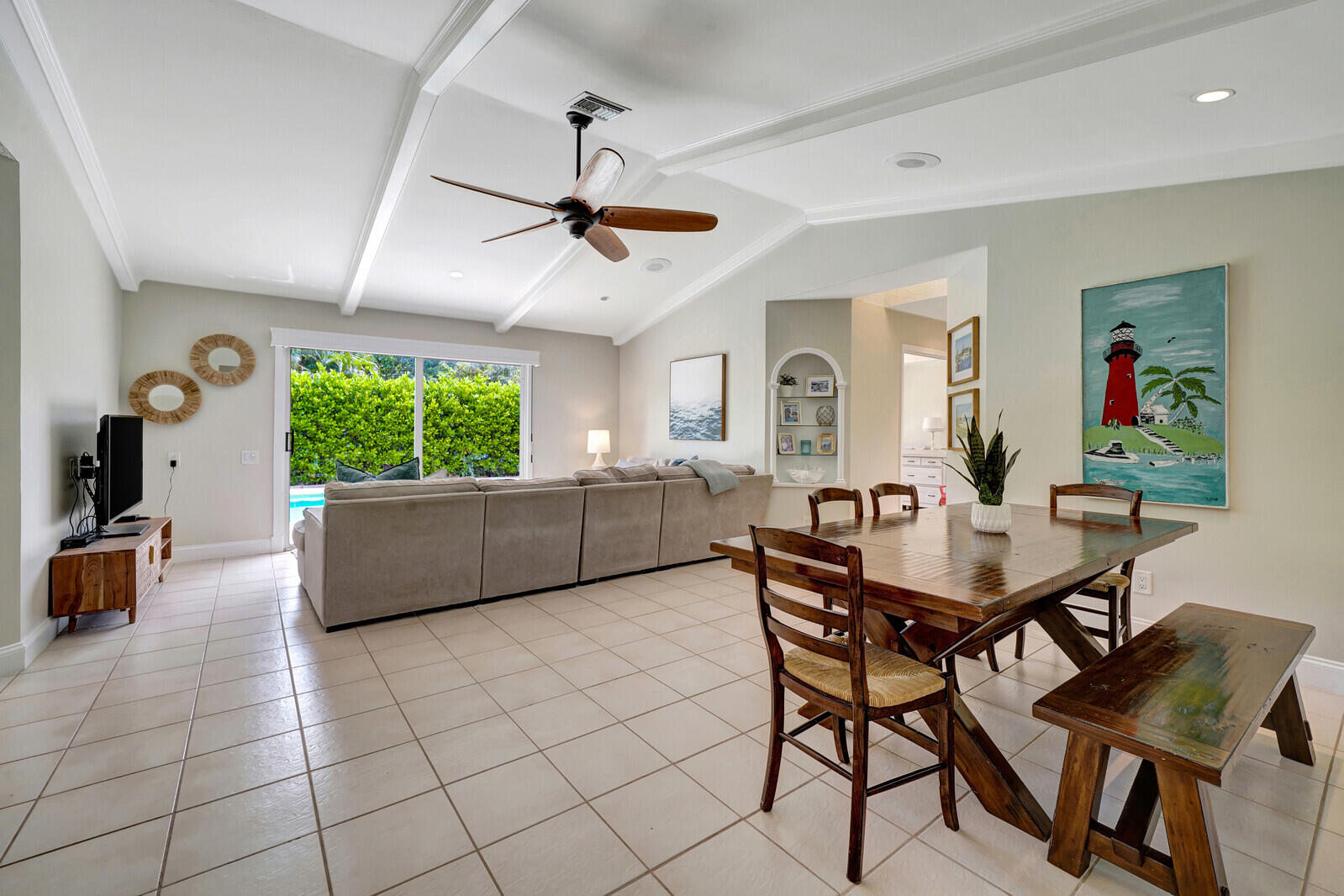 6009 Eagles Nest Drive Jupiter, FL 33458 - Photo 7 of 49 a view of a livingroom with furniture and a window