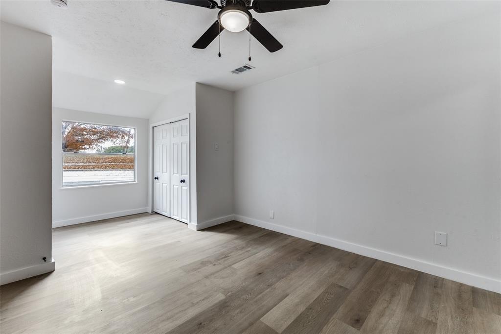 2723 Gus Thomasson Road Dallas, TX 75228 - Photo 12 of 26 a view of an empty room with a window