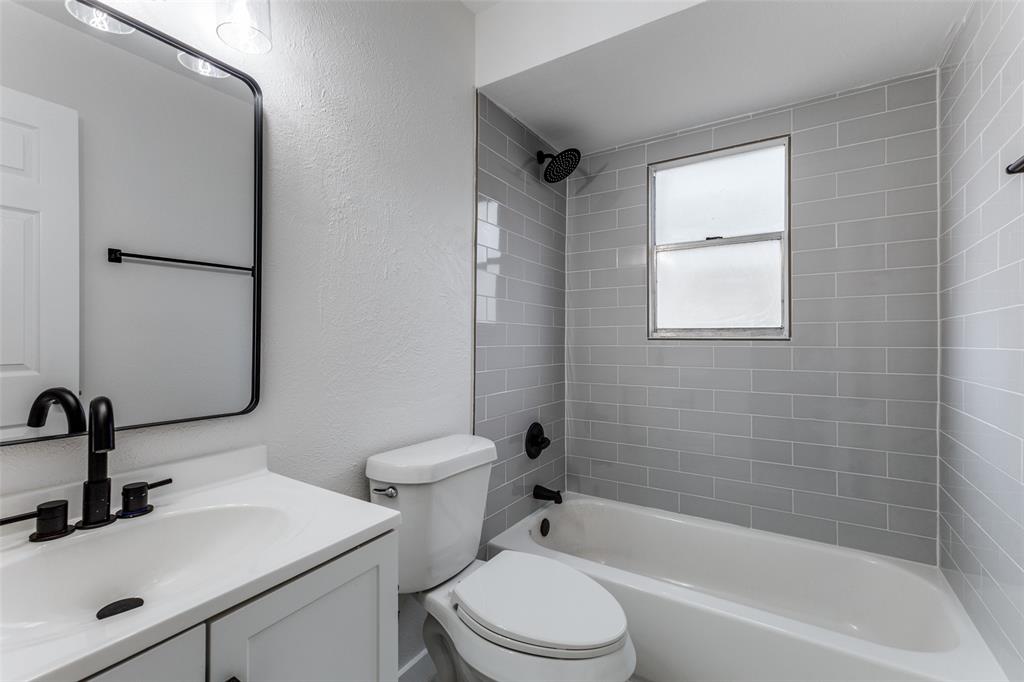 2723 Gus Thomasson Road Dallas, TX 75228 - Photo 18 of 26 a bathroom with a sink toilet and shower