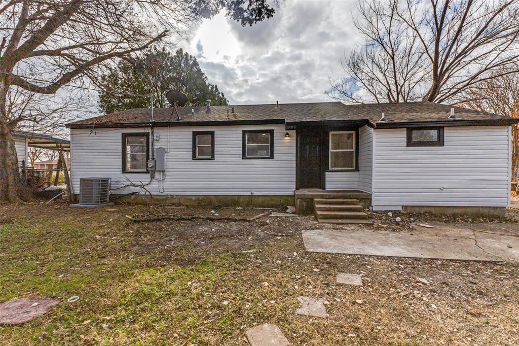 2723 Gus Thomasson Road Dallas, TX 75228 - Photo 22 of 26 a view of a house with a yard