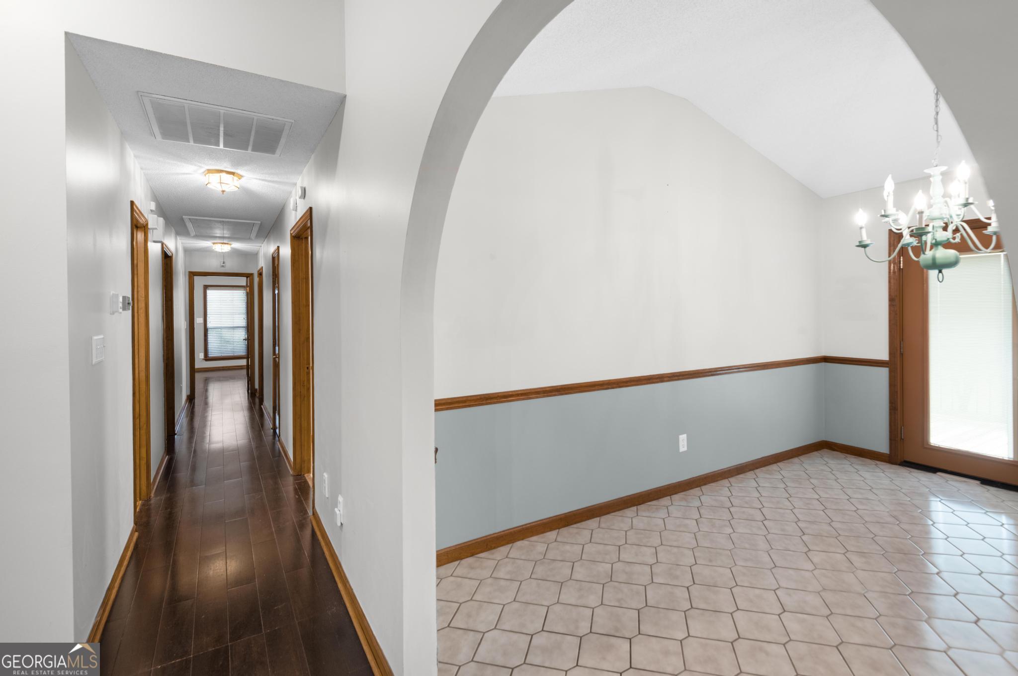 4909 Perry Road Claxton, GA 30417 - Photo 20 of 53 a view of a hallway with wooden floor