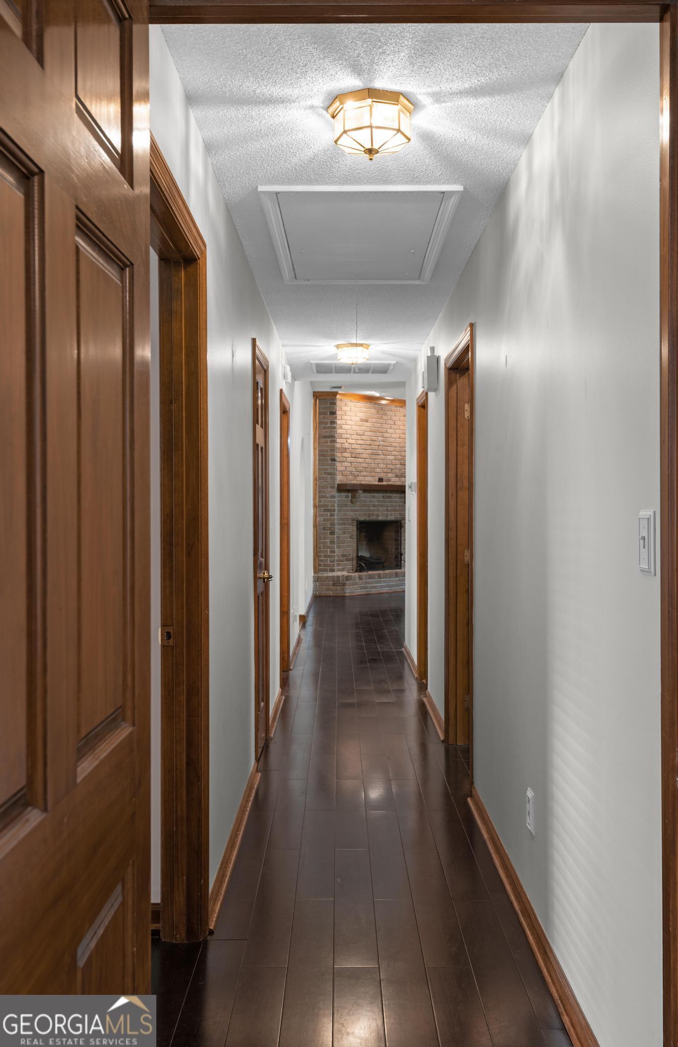 4909 Perry Road Claxton, GA 30417 - Photo 39 of 53 a view of a hallway with a dining table