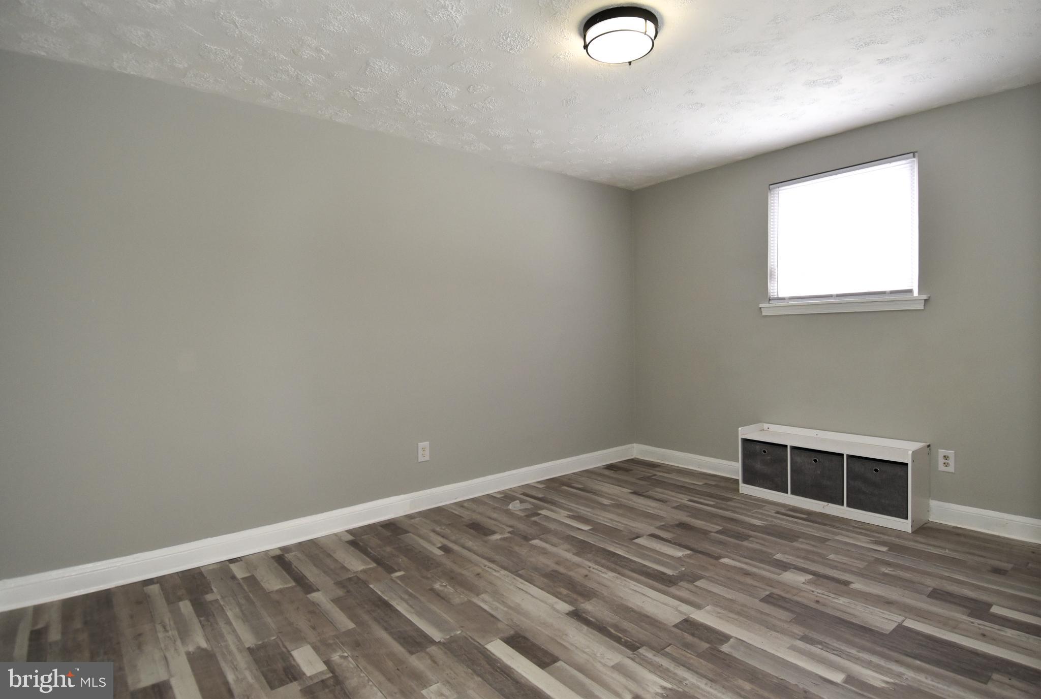 8208 Bellefonte Lane, Unit 5 Clinton, MD 20735 - Photo 10 of 17 Bright and airy space with modern flooring.