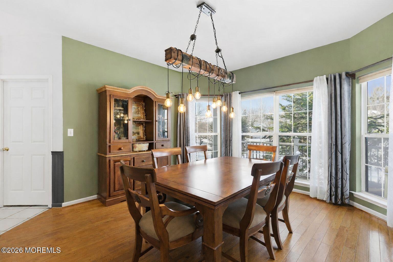 9 Kindling Way Jackson, NJ 08527 - Photo 10 of 33 a view of a dining room with furniture window and wooden floor