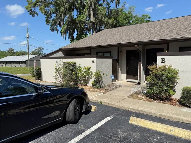 a car parked in front of a house