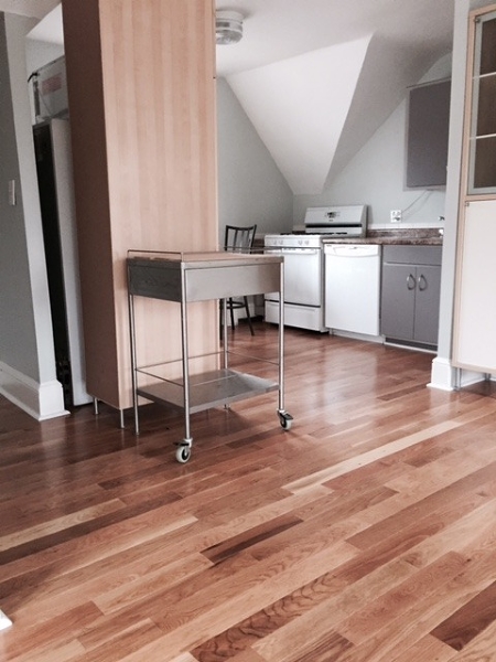 12 Orchard Road, Unit 3 Maplewood, NJ 07040 - Photo 2 of 11 a room with lots of wooden furniture and windows
