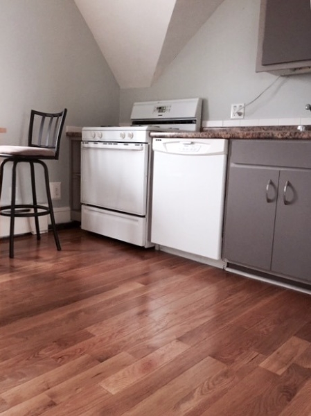 12 Orchard Road, Unit 3 Maplewood, NJ 07040 - Photo 3 of 11 a view of a kitchen with wooden floor