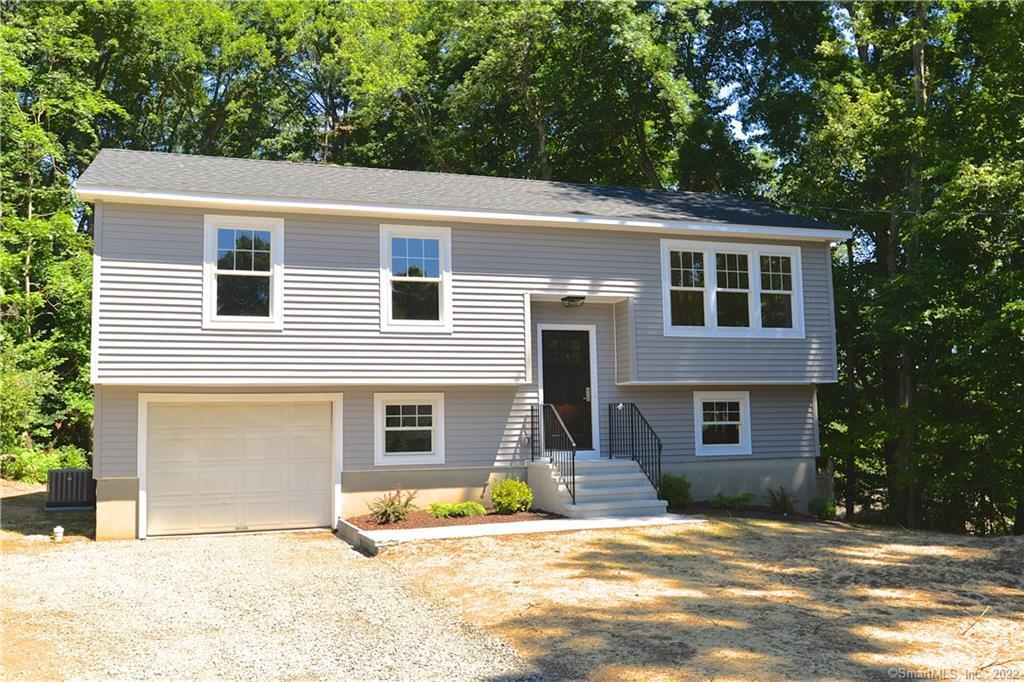 10 Ramapoo Hill Road Ridgefield, CT 06877 - Photo 1 of 1 a backyard of a house