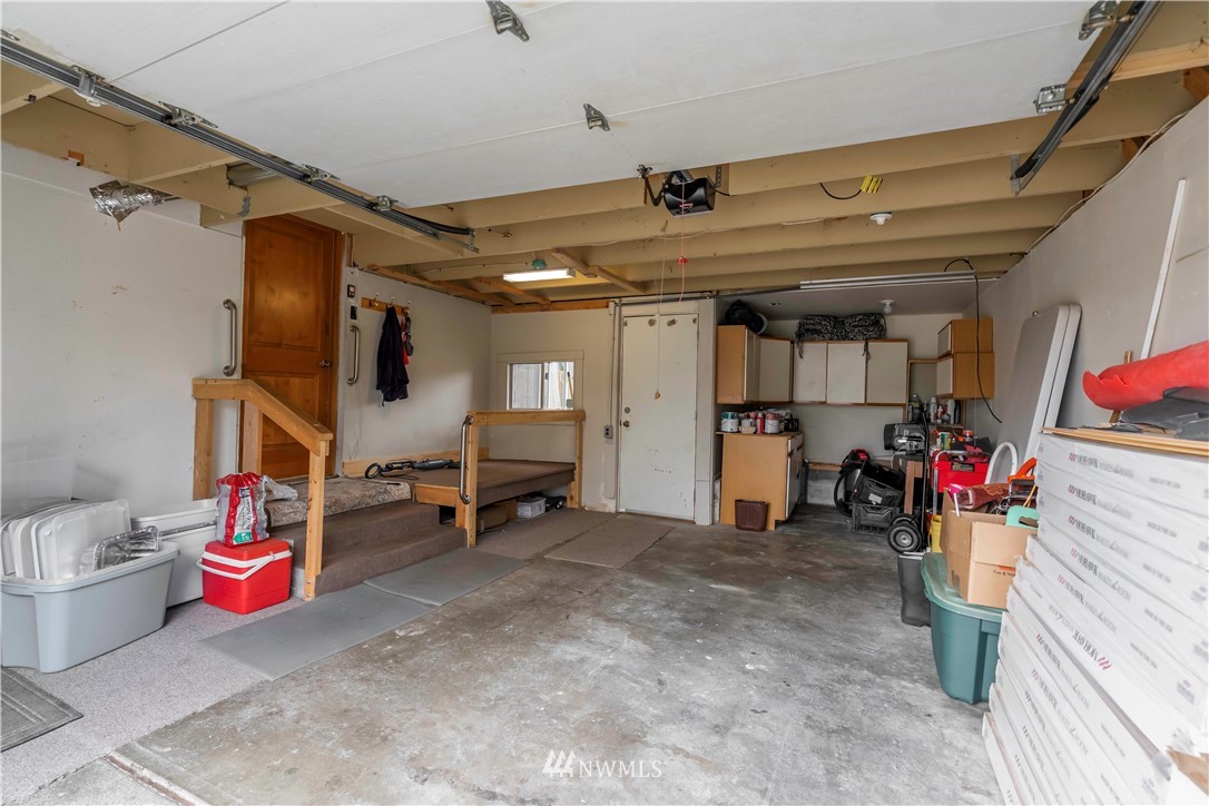 6502 Avondale Road Southwest, Unit 4 Lakewood, WA 98499 - Photo 27 of 28 a view of a storage room with shelves