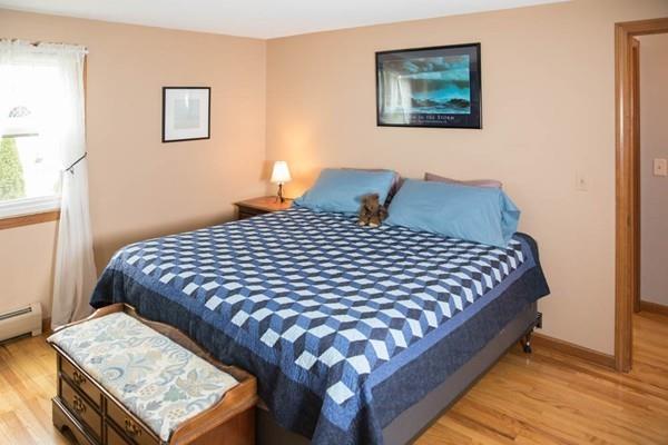 25 Fairview Road Wilbraham, MA 01095 - Photo 13 of 32 a large bed sitting in a bedroom next to a window