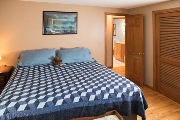 25 Fairview Road Wilbraham, MA 01095 - Photo 14 of 32 a bedroom with a bed and wooden floor