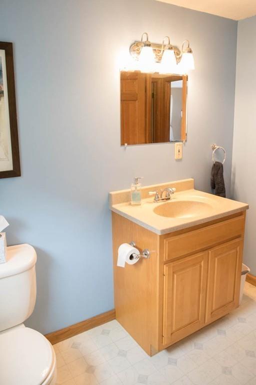 25 Fairview Road Wilbraham, MA 01095 - Photo 17 of 32 a bathroom with a sink a toilet and mirror