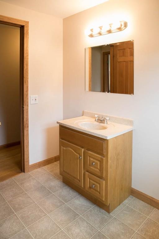 25 Fairview Road Wilbraham, MA 01095 - Photo 25 of 32 a bathroom with a sink vanity and mirror