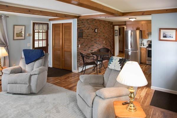 25 Fairview Road Wilbraham, MA 01095 - Photo 4 of 32 a living room with furniture and a window