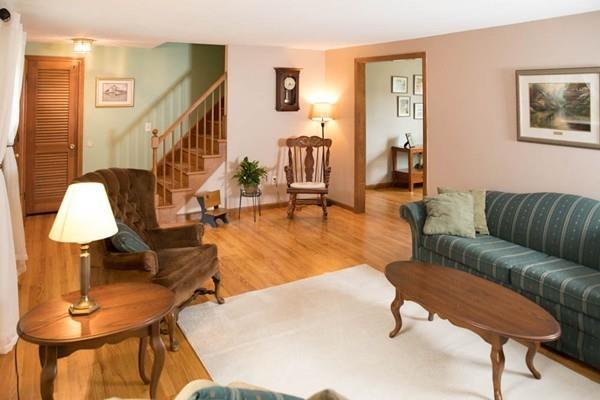 25 Fairview Road Wilbraham, MA 01095 - Photo 10 of 32 a living room with furniture and a lamp