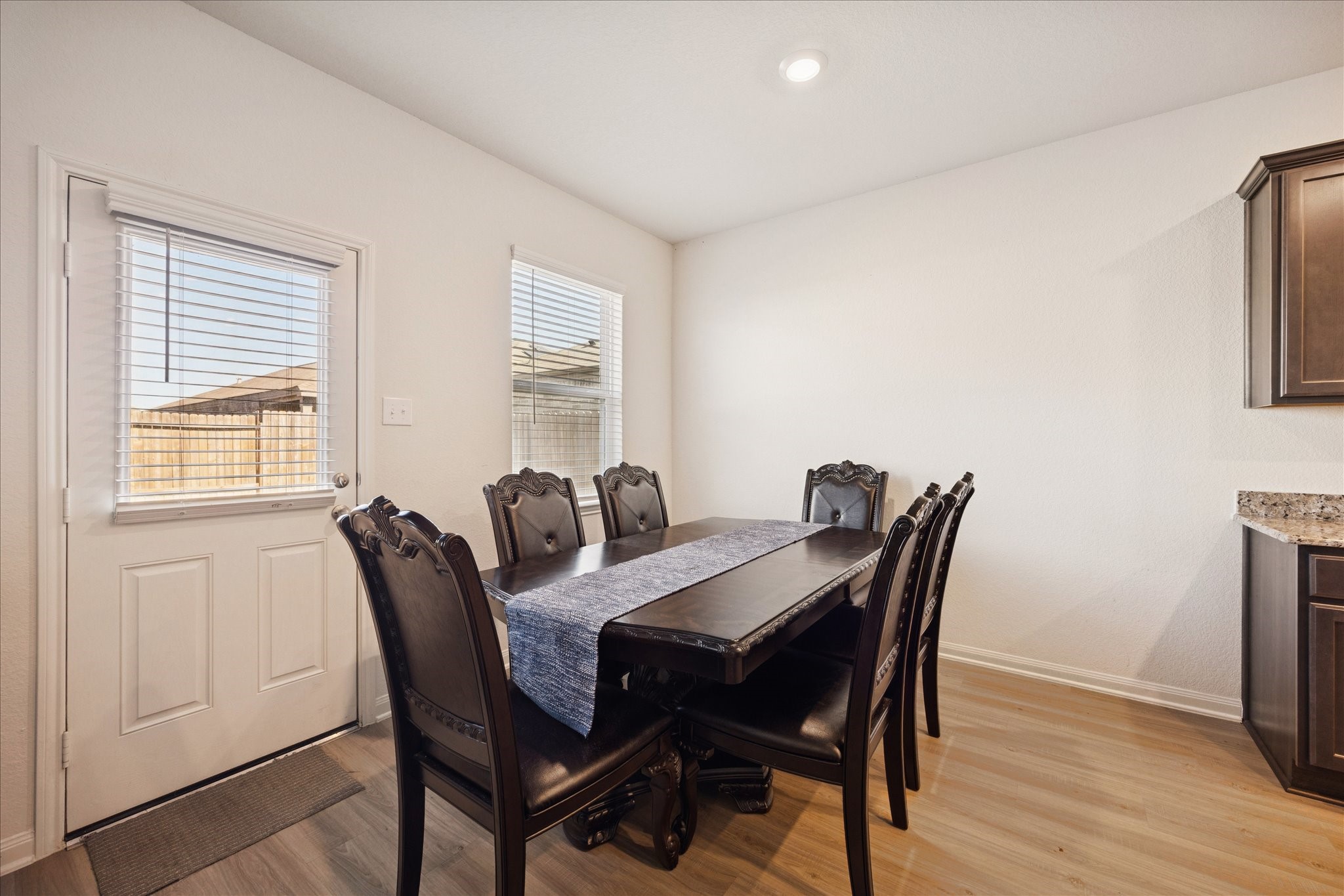 6215 El Turquesa Drive Houston, TX 77048 - Photo 3 of 16 a view of a dining room with furniture and wooden floor