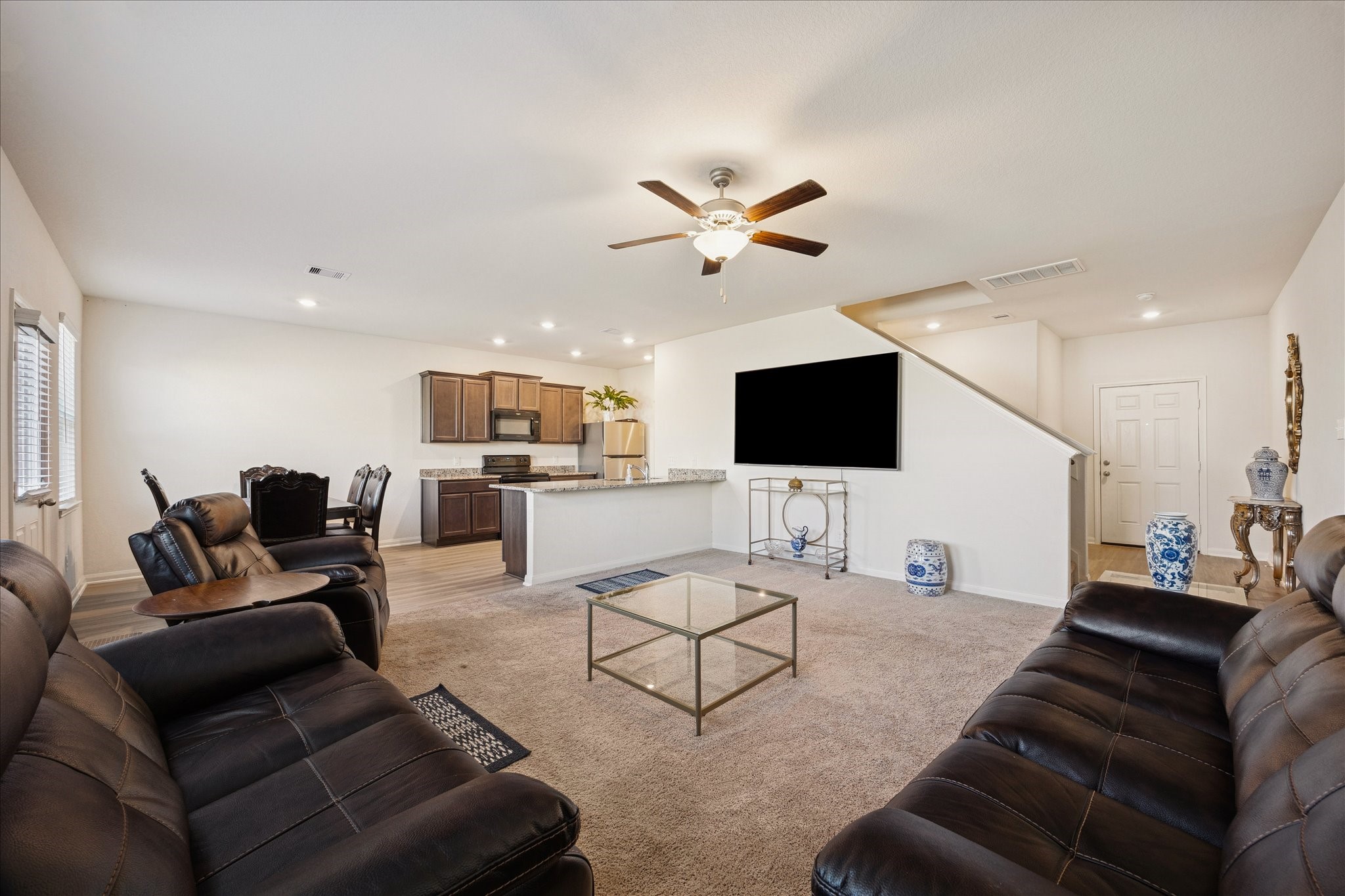 6215 El Turquesa Drive Houston, TX 77048 - Photo 5 of 16 a living room with furniture and a flat screen tv