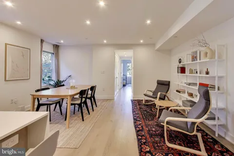 a workspace with furniture and wooden floor